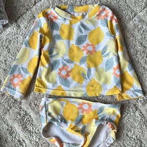 Carters two piece swim suit. 18M